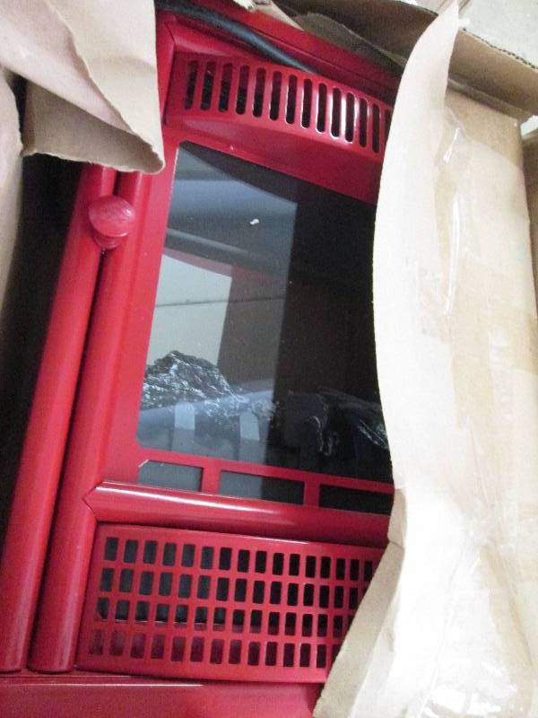 lot 55 image: Electric Stove Red open box , untes...