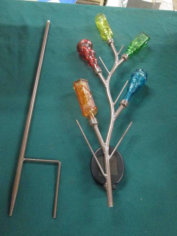 lot 67 image: Bottle Solar Garden Stake open box,...