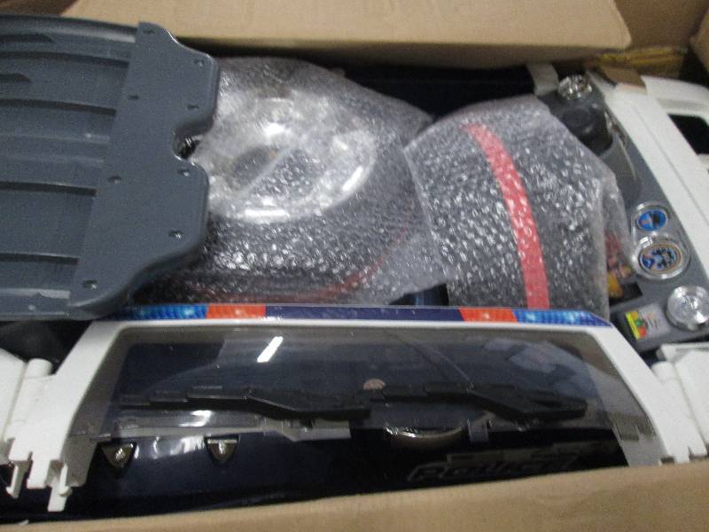 lot 127 image: Ride-On Police Car open box, untest...
