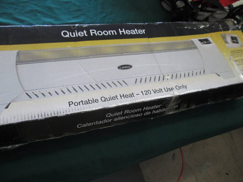 lot 141 image: Lasko Quiet Room Heater open box, u...