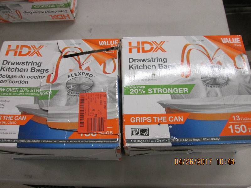 lot 214 image: 2 boxes of hdx drawstring 13 gallon...