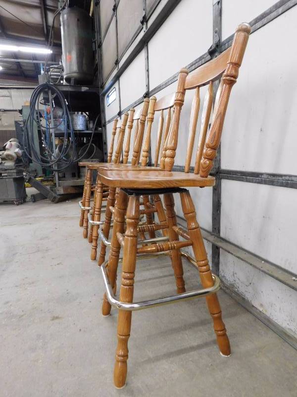 lot 59 image: Four Oak Swivel Bar Stools