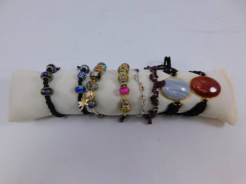 lot 32 image: Lot of Bracelets wDisplay Pillow