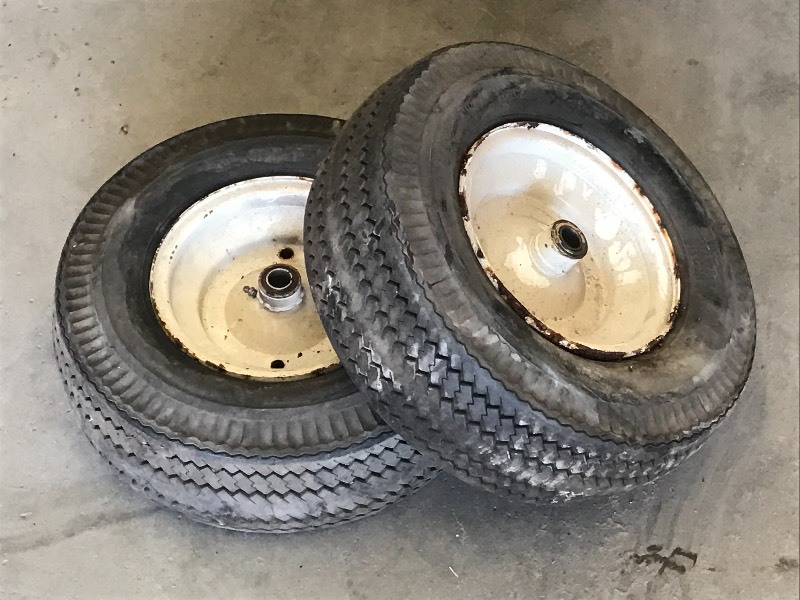 (2) Tires With Spindle Wheels