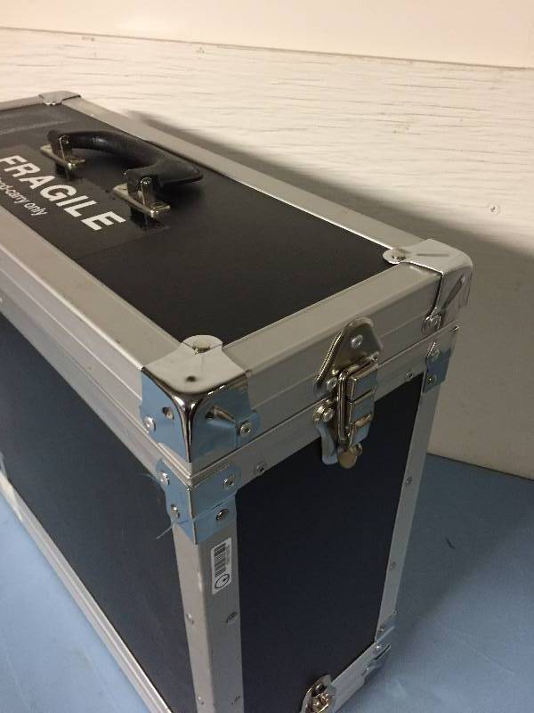 lot 55 image: Hard-Sided ATA-Rated Attache-Style Travel Case with Rack Unit & Tandberg Video Conference System