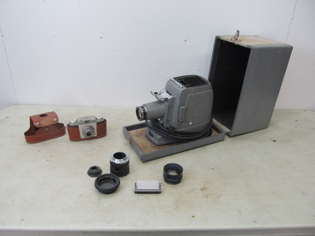 lot 45 image: Vintage Projector Camera Lenses etc