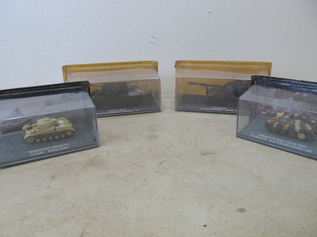 lot 123 image: 4 NIB WW2Military Diecast Vehicles