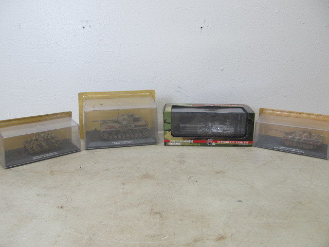 lot 124 image: 4 NIB WW2Military Diecast Vehicles