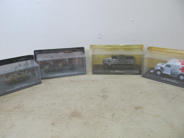 lot 126 image: 4 NIB WW2Military Diecast Vehicles