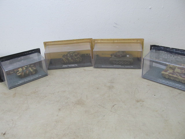 lot 127 image: 4 NIB WW2Military Diecast Vehicles