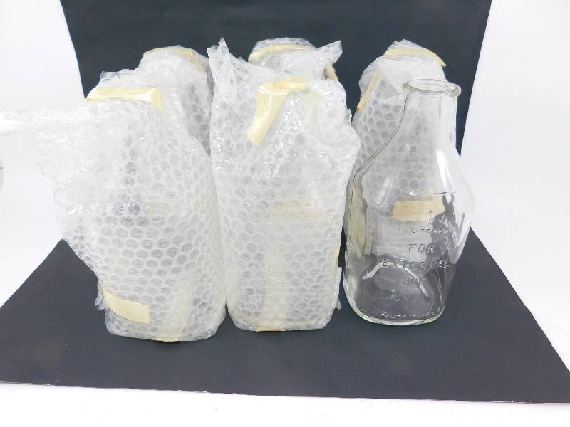 lot 74 image: Lot of 6 U.S. Military 1000cc Heavy-Duty Glass Bottles