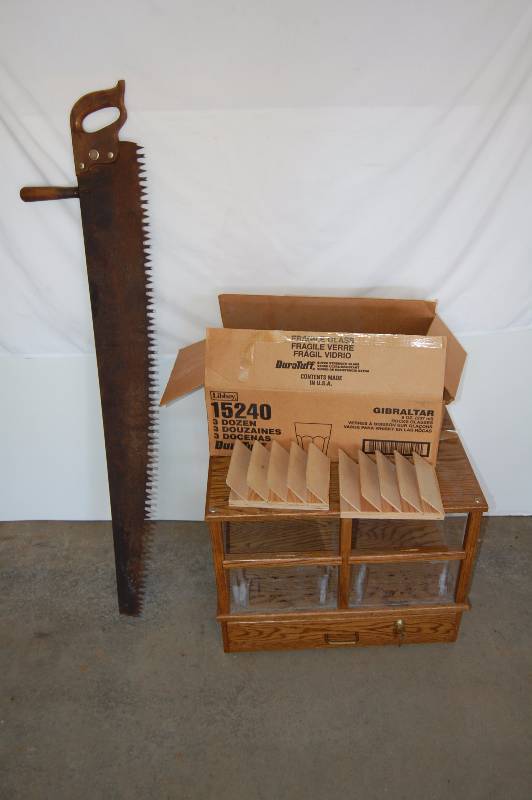 Saw, Pull Tab Box, and Glassware