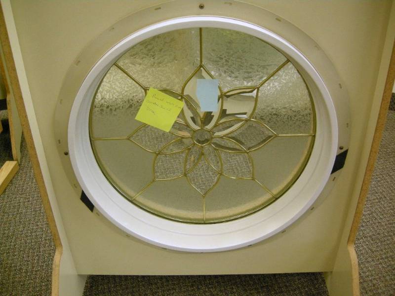 lot 65 image: Round White Vinyl Window