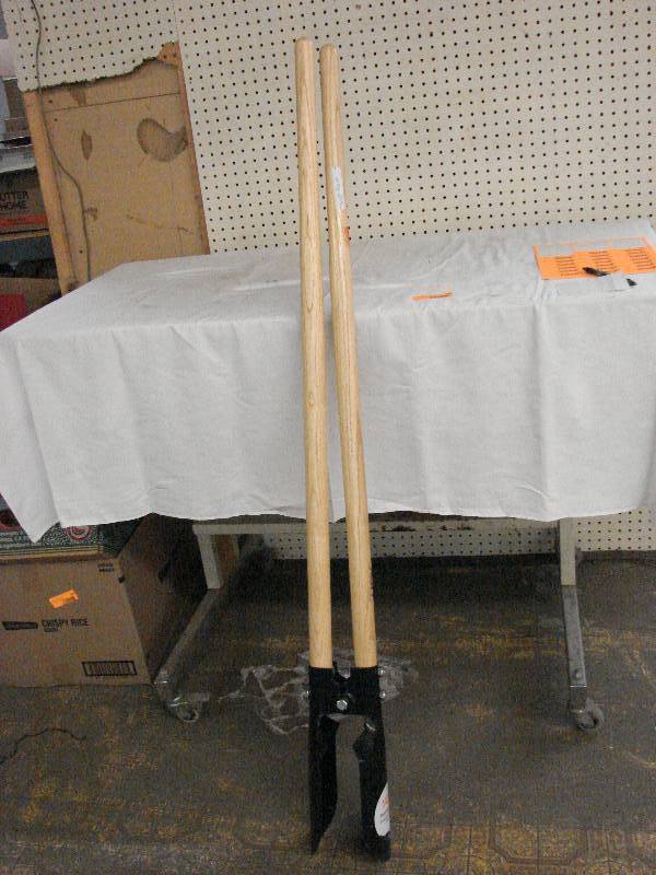 lot 310 image: POST HOLE DIGGER