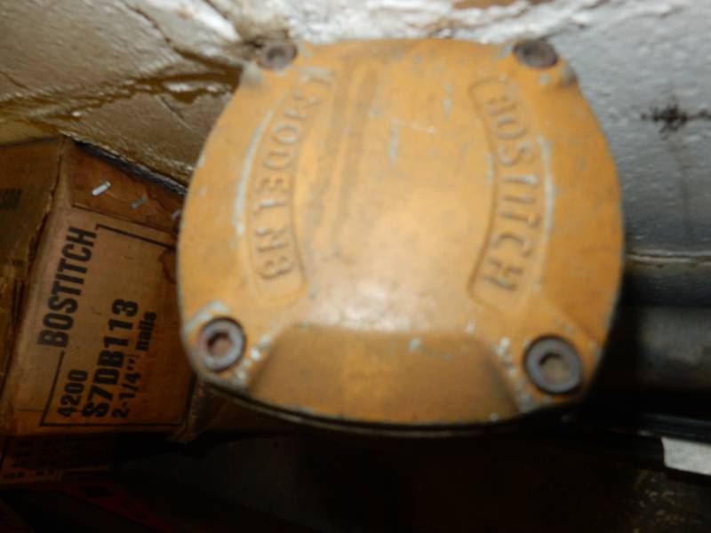 lot 97 image: Bostitch Pneumatic Stapler and staples.. Works