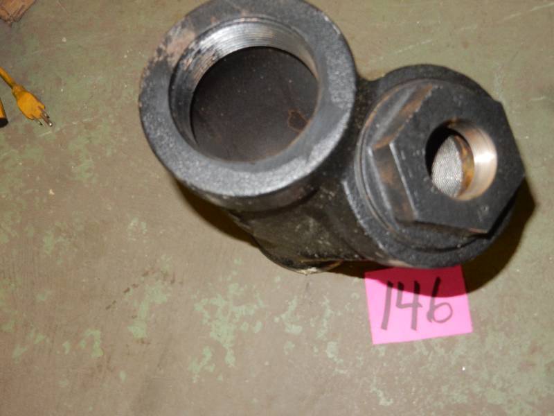 lot 146 image: Cast Iron Y joint with Filter on Outlet..New Never Been Installed