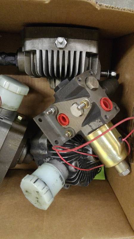 lot 50A image: Eaton Hydro Static Model 7 and 11 Transmissions and 2 Valves
