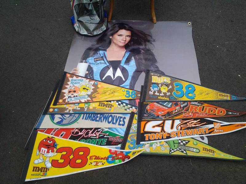 lot 43 image: Assorted NASCAR Flags, Blow Up Helmet, Life Size Danica Patrick