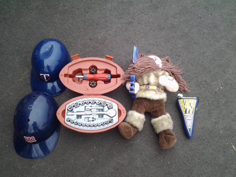 lot 44 image: 2-Twins Batting Helmets, Ragnar Doll, Football Tool Kit