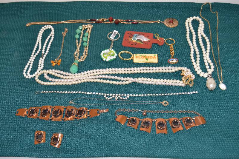 lot 107 image: Necklaces and Keychains