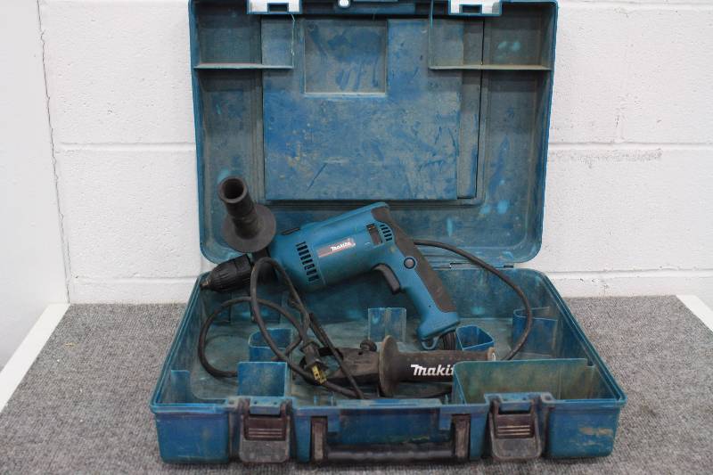 lot 64 image: Makita Hammer Drill HP1621