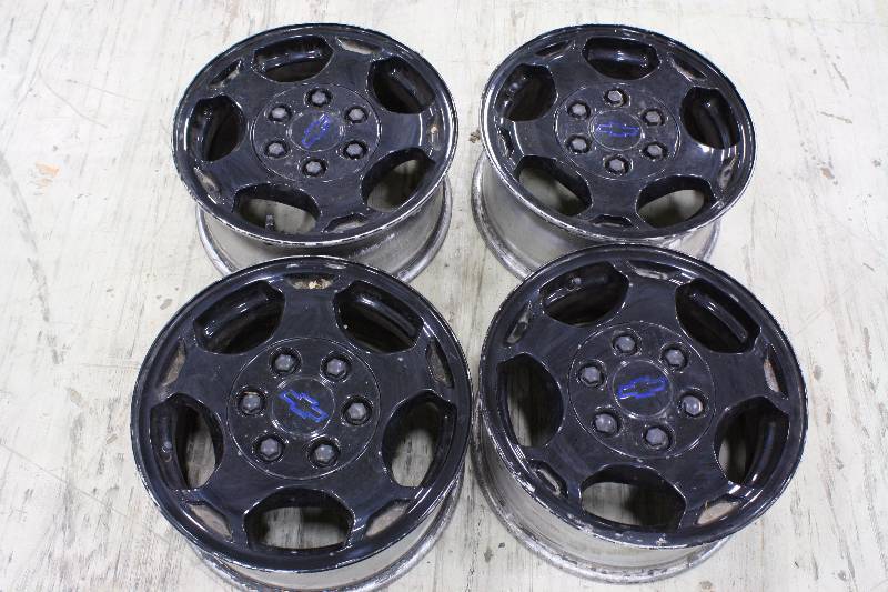 lot 132 image: Set of 4 Black Rims  Chevy 6 Lug