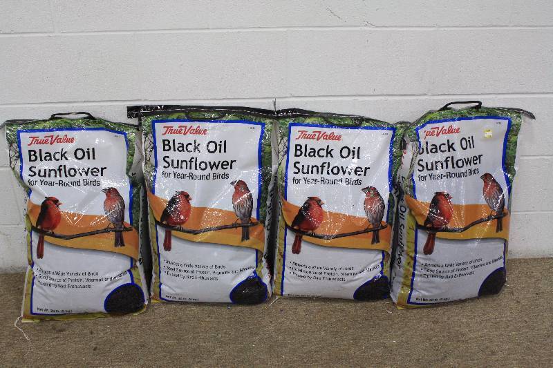 lot 26 image: 4 Black Oil Sunflower 20lb Bird Seed Bags