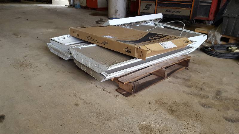 lot 34 image: Lot of (7) Commercial Lights - 4 x 2 - (5) Cooper and (3) different unknown brand