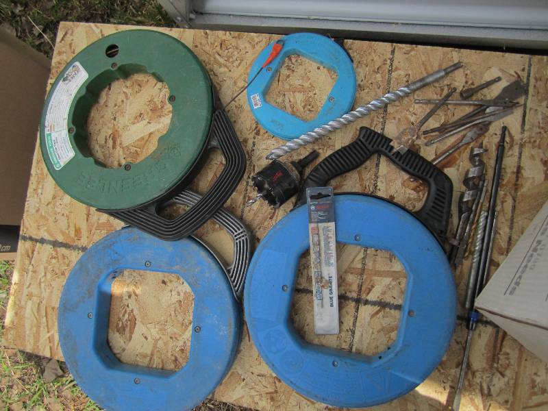 Lot of wire fish tape and drill bit...