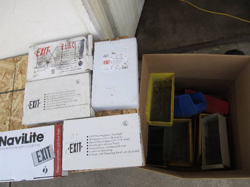 Lot of EXIT signs and plastic organ...