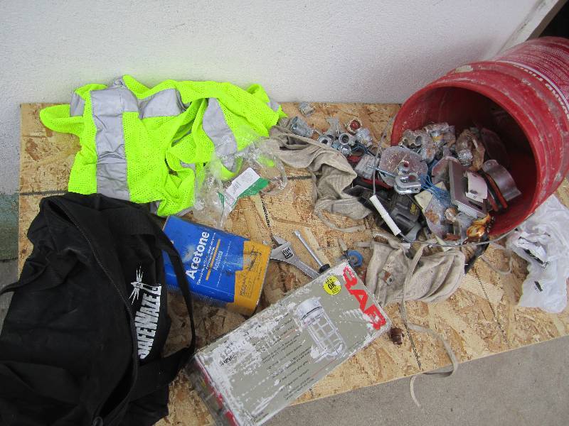Bucket filled with tools, electrica...