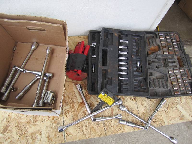Bottle jack, lug wrenches and socke...