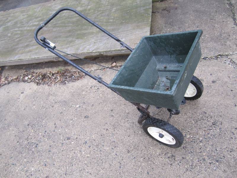 Seed  lawn spreader...