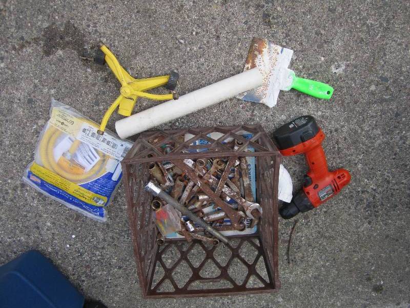 Lot of wrenches, sprinkler, gas lin...