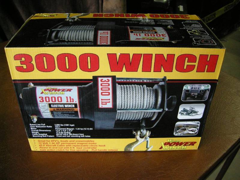 lot 137 image: Woods 3000lb Power Winch