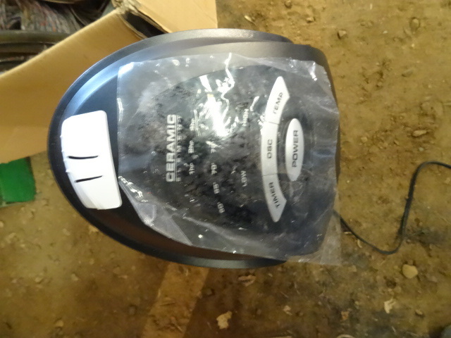 lot 11 image: Lasko Ceramic element tower heater....
