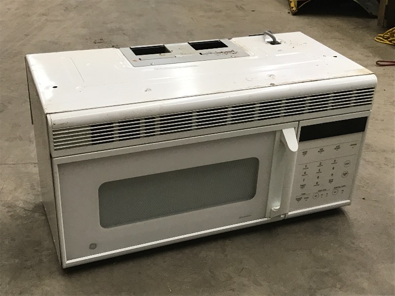 lot 35 image: GE SpaceMaker Under-Cabinet Microwa...