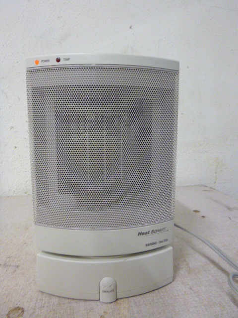 lot 91 image: Heat Stream Oscillating Electric Heater