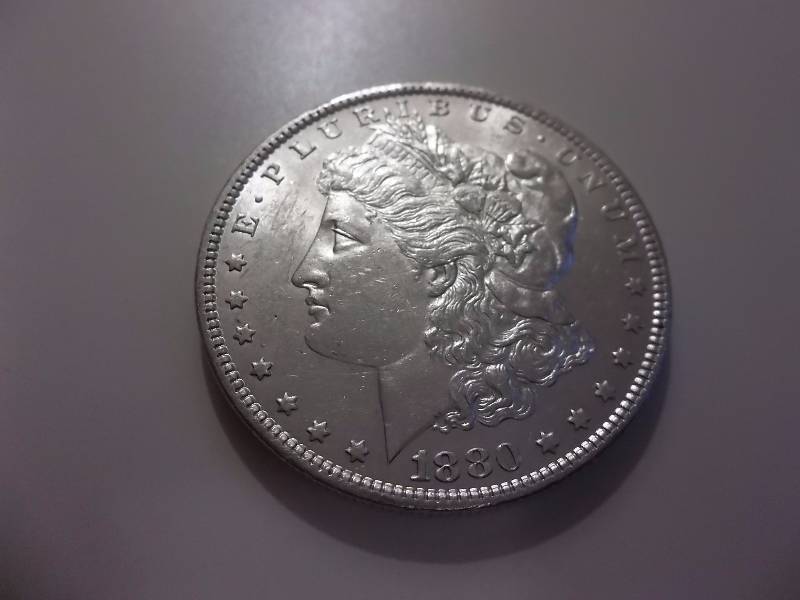 1880 O  Morgan Silver Dollar Very High Grade MS (In MS60 Valued  $110.00)