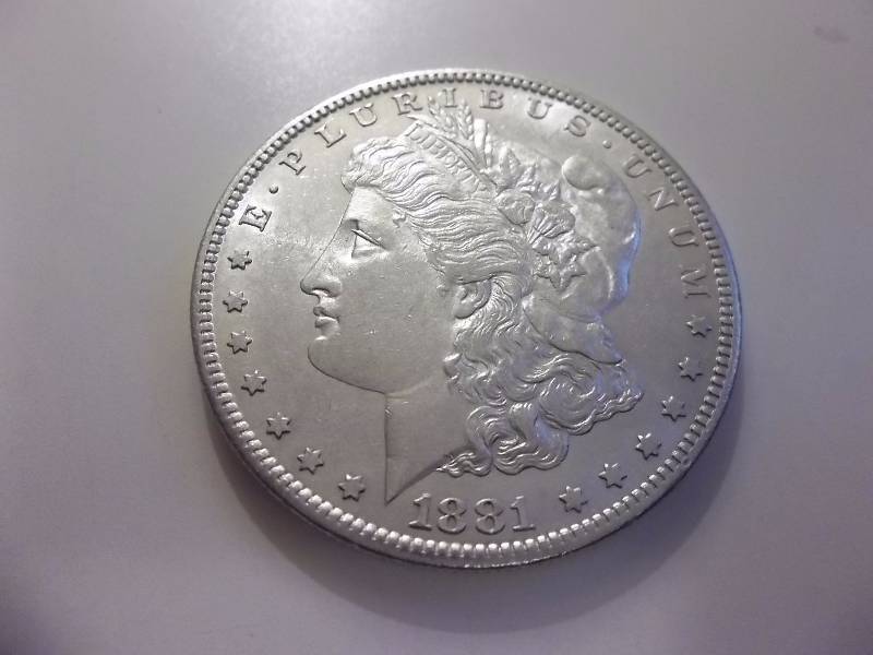 1881 S Morgan Silver Dollar Very High Grade MS (In MS60 $65.00)