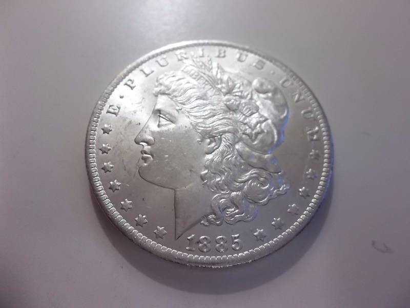 1885 O Morgan Silver Dollar High Grade MS (In MS60 Valued  $70.00)