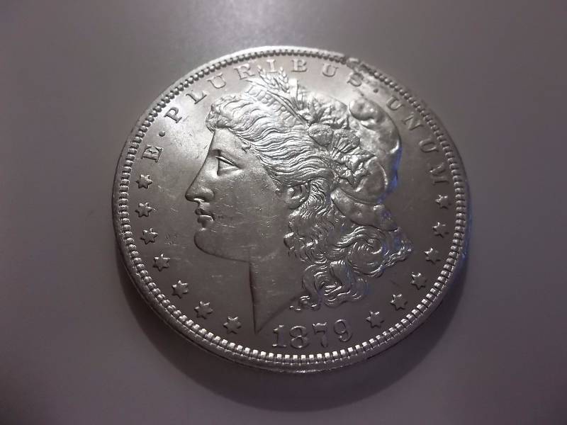 1879 O  Morgan Silver Dollar Very  High Grade MS (In MS60 Valued  $100.00)