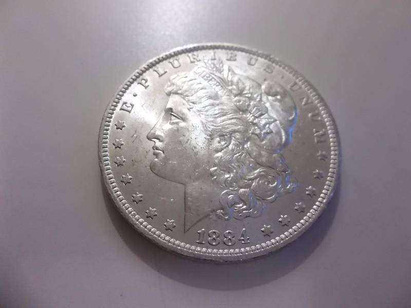 1884 O Morgan Silver Dollar Higher Grade MS (In MS60 Valued $70.00)