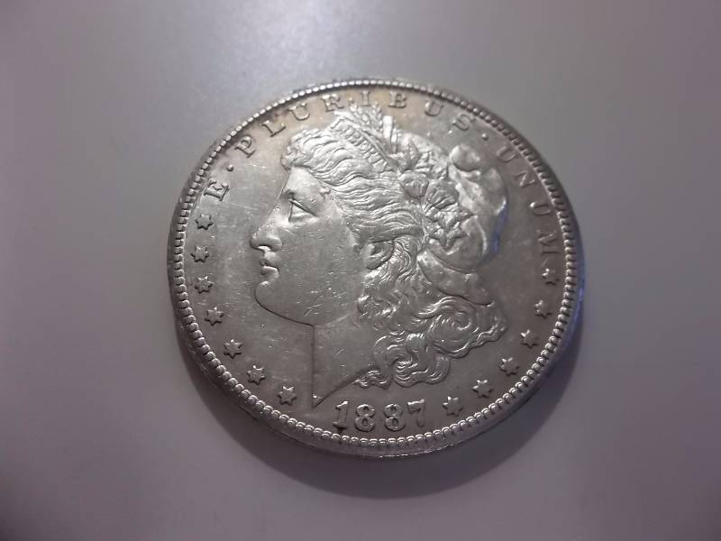 1887 S  Morgan Silver Dollar Very High Grade  MS (In MS60 Valued  $140.00)