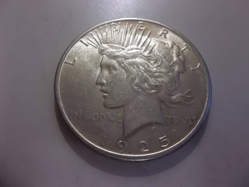 1925  Silver Peace Dollar Very High Grade MS