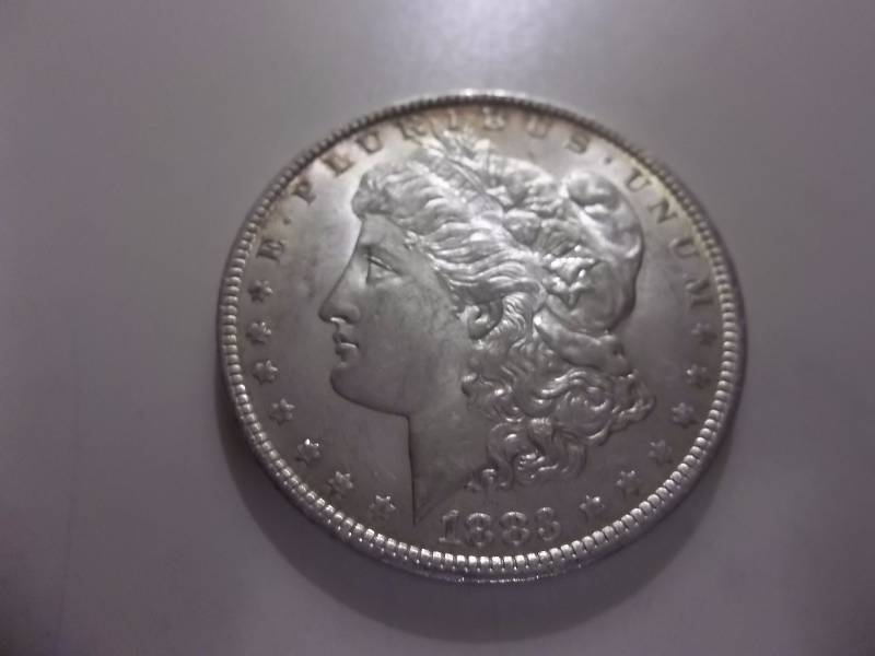 1883 O Morgan Silver Dollar High Grade MS (In MS60 $70.00)