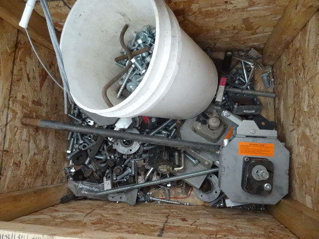 Crate of misc bolts. Chain operator...
