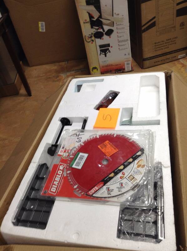 lot 5 image: Ridgid 12 in Dual Bevel Slinding Miter Saw in like new condition