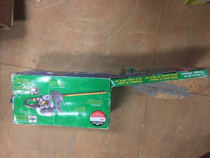 lot 50 image: Ryobi 22 in. 26 cc Gas Hedge Trimmer Model#  RY39505B  open box never used