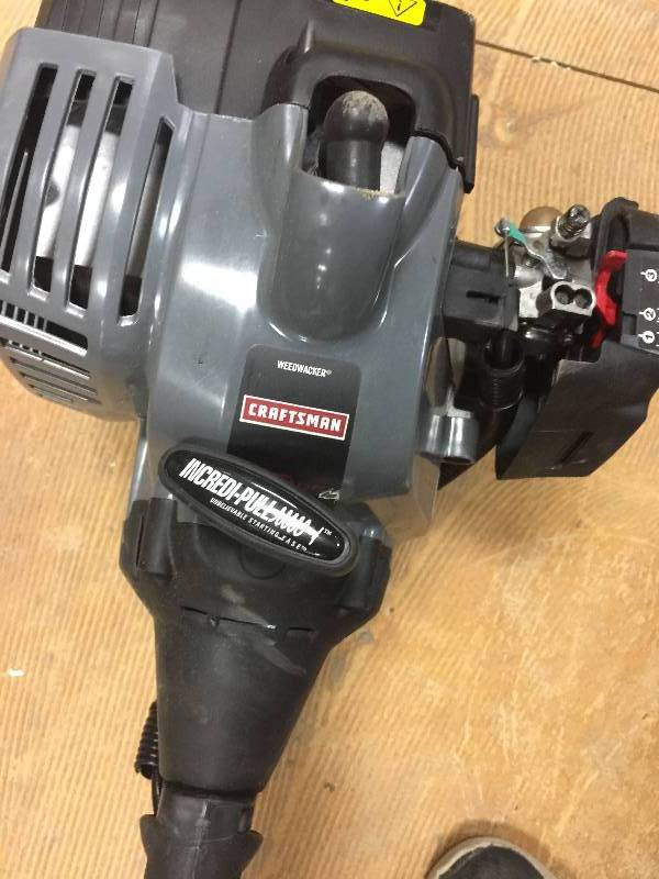 lot 62 image: Craftsman 2 Cycle Straight Shaft Gas Powered  in working conditions
